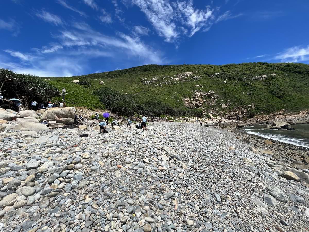 Snapshot of Lap Sap Wan beach while the cleaning is in progress by Velotrade employees.