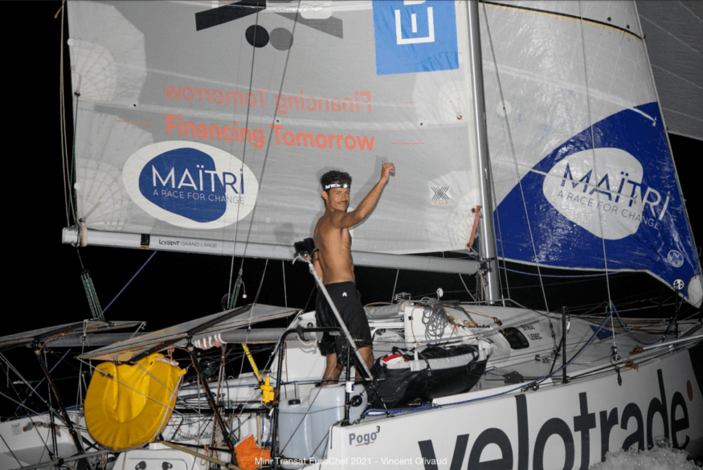 Closer night shot of Velotrade sailboat and skipper Briuec Lebec during the Mini Transat Leg 2 race.