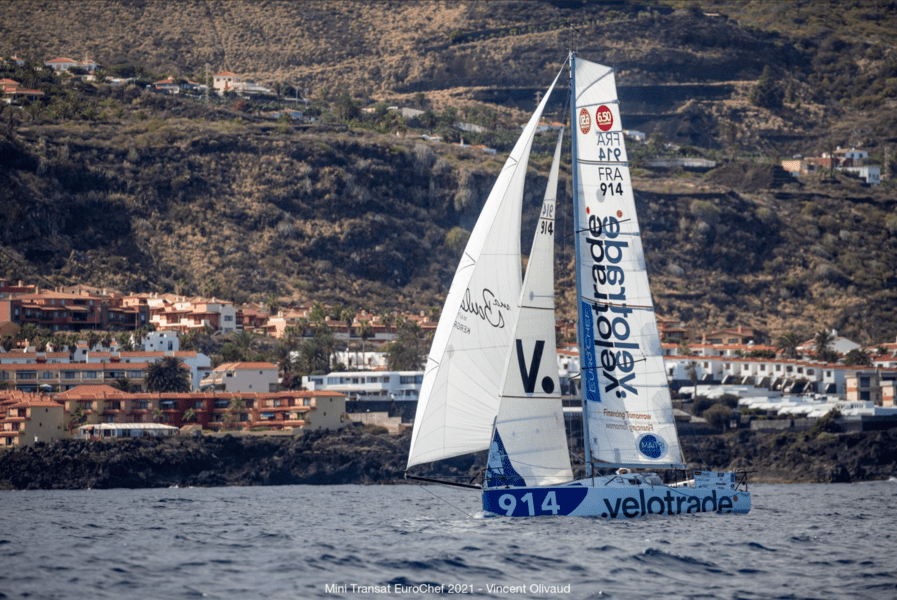 Velotrade sailboat landscape shot with the beautiful town of Getxo in the background.